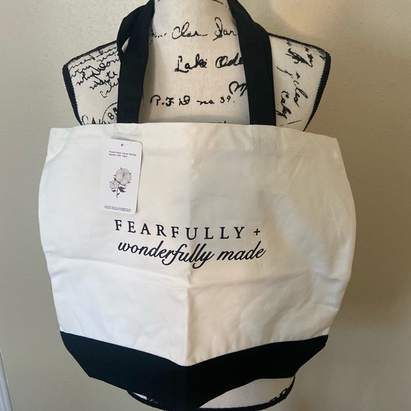 Cute white and black cotton tote washable great to carry on. Last one - Picture 2 of 3